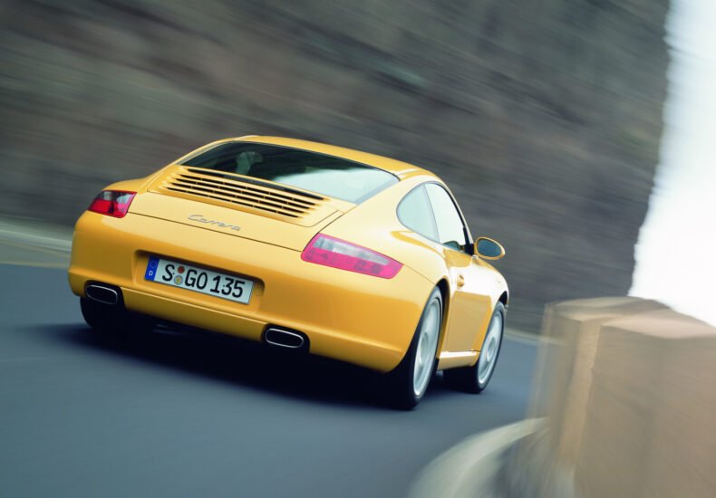 2005 Porsche 911 Carrera Coupe on the road rear