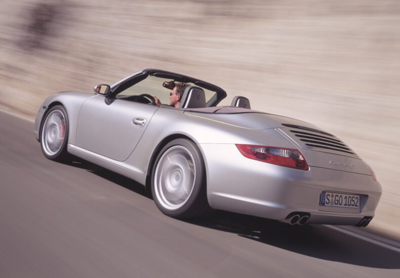 2006 Porsche 911 Carrera S Cabiolet on the road rear view